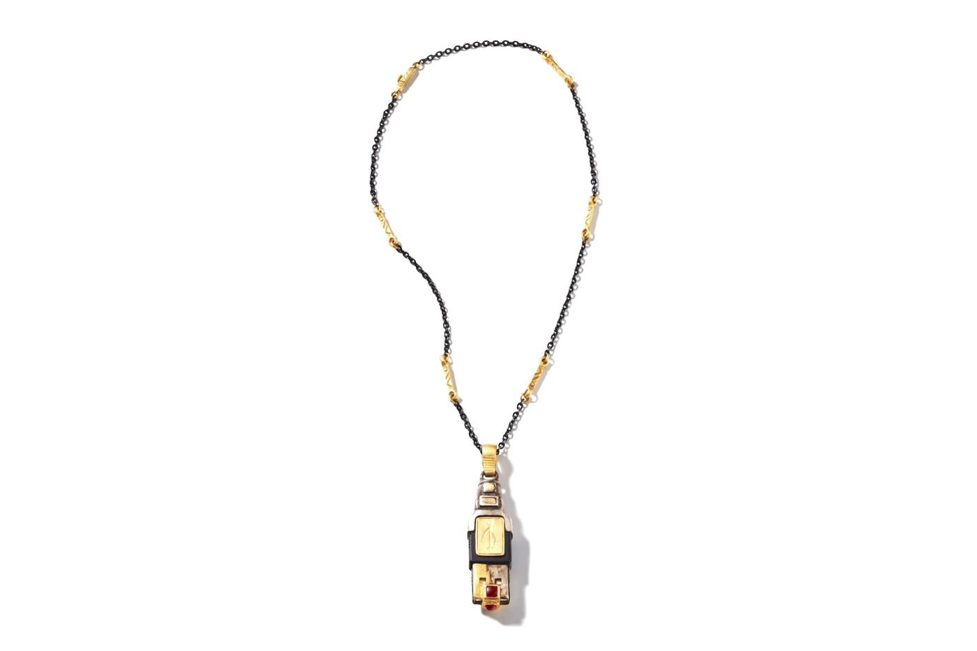 A USB dongle with is encrusted with gold and gems, to make a stunning necklace.